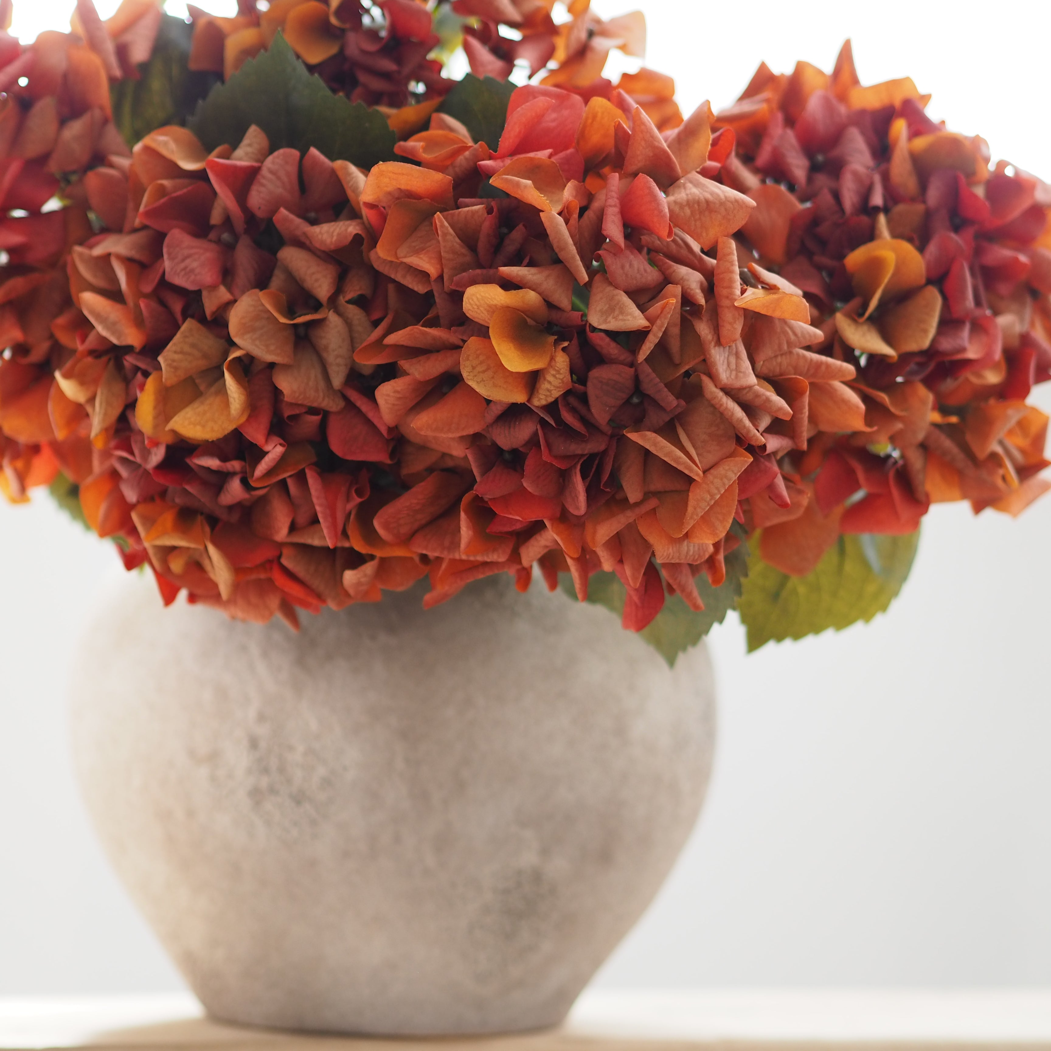Real Touch Burnt orange hydrangea stem faux flowers